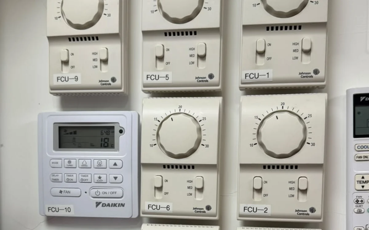 Commercial air-conditioning controller displays and equipment location visible from a safe position